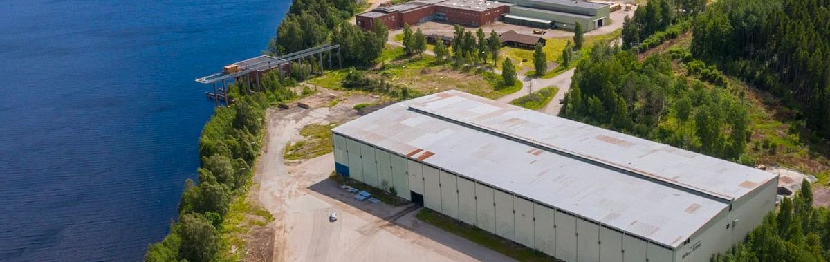 Industrial buildings beside a lake in Billingsfors, Sweden